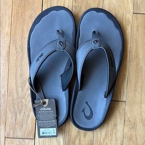 Olukai Gray and Black Flip Flops